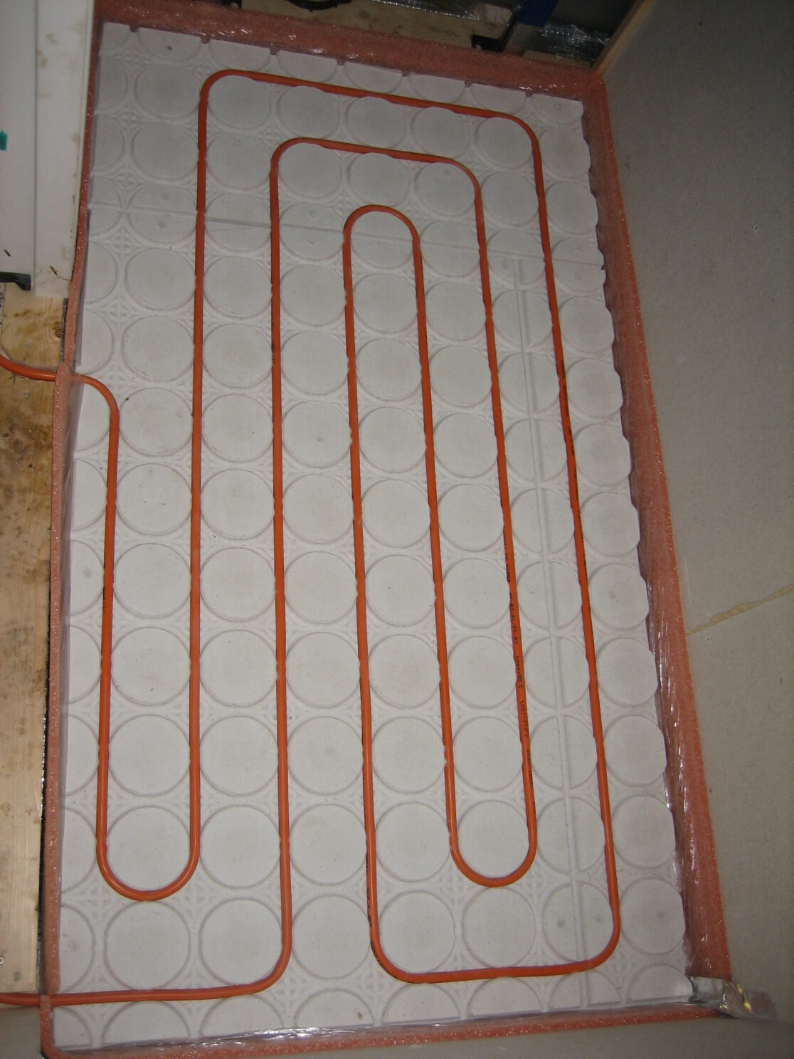 Vloerverwarming in toilet op woonschip